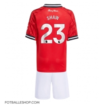 Manchester United Luke Shaw #23 Replika Hjemmedrakt Barn 2025-26 Kortermet (+ bukser)